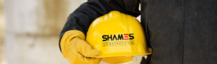 hardhat with shames construction logo